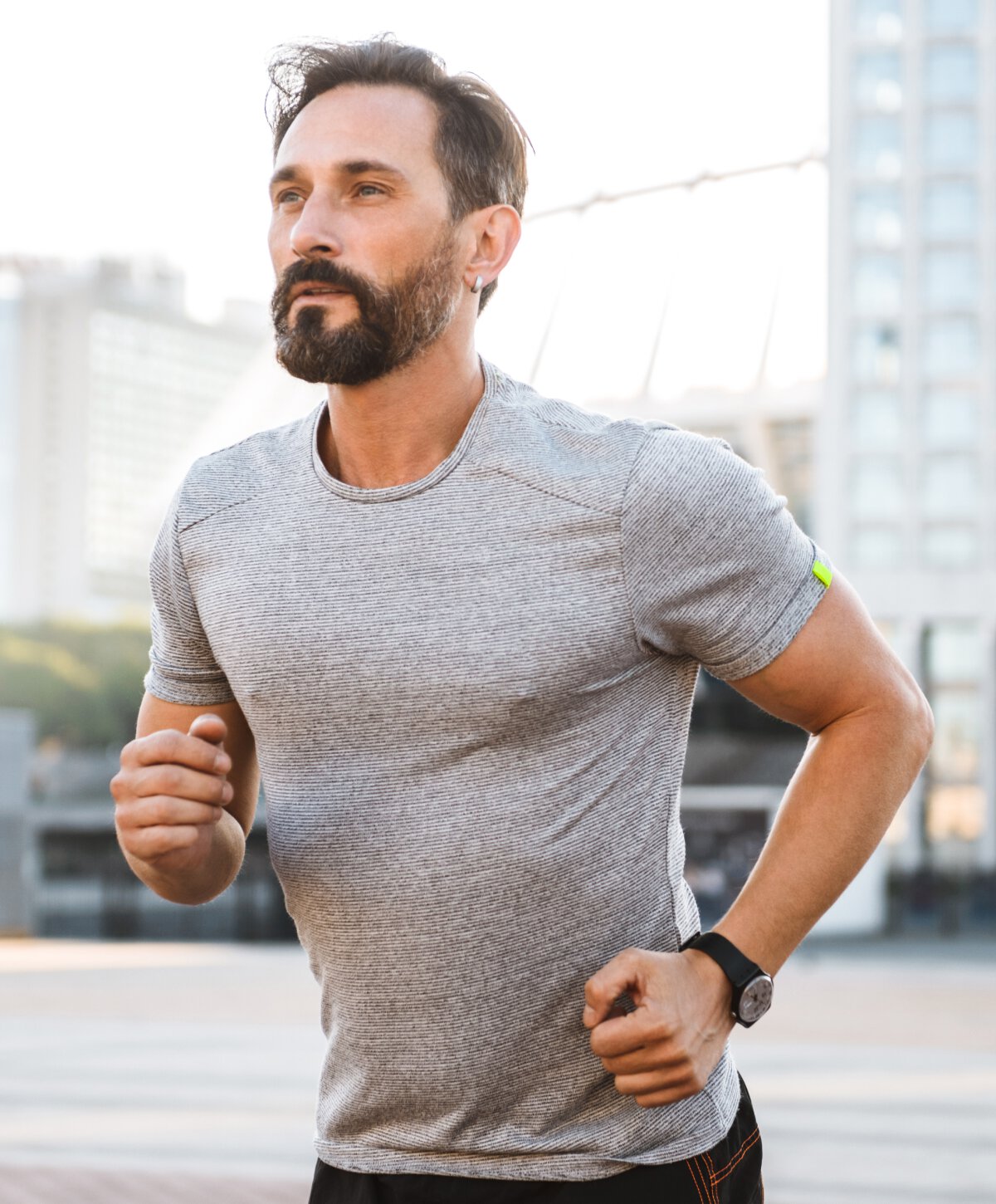 Surrey gynecomastia surgery model with brown hair