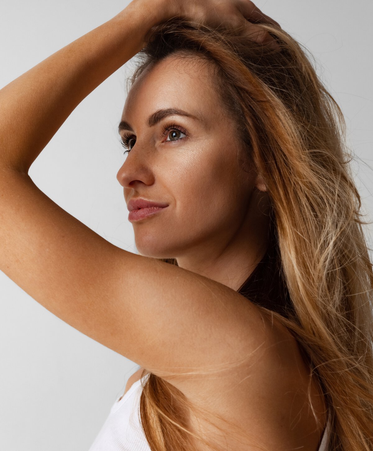 Surrey rhinoplasty model with blonde hair